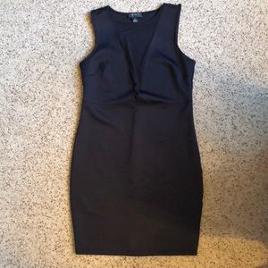 Plunging black mini dress